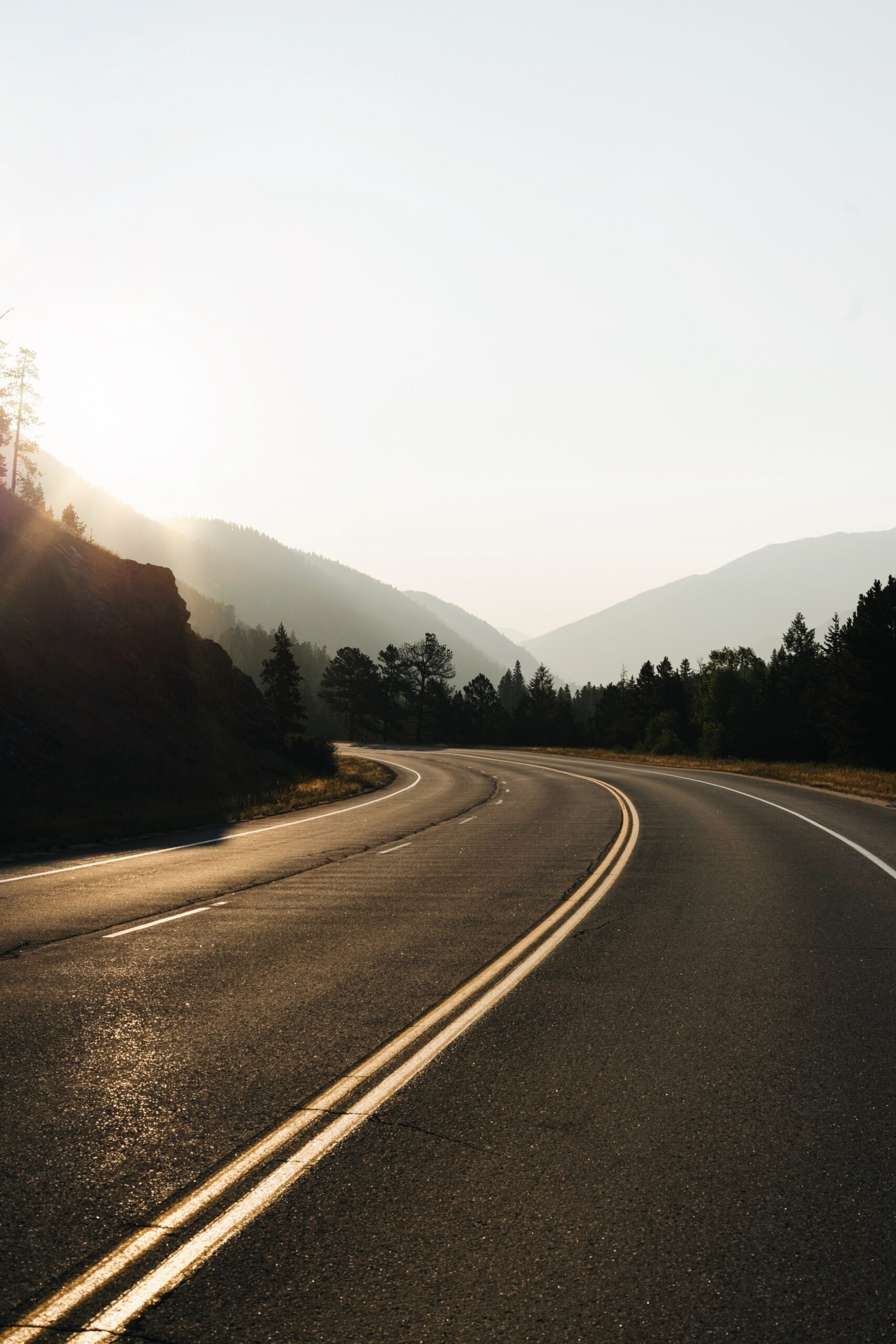 Journal black asphalt road at sunset